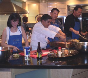 Servatius Adalberto Diaz makes his weekly cooking class a hands-on experience for students. Photo by David Servatius.