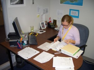 Amelia Self works at her desk at the IRC.