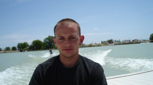 Brett Perfili, a journalism student at the University of Utah, riding in a boat at his favorite getaway spot in Delta, Utah.