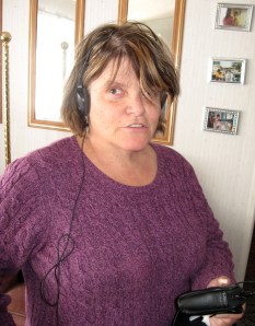 Lana McKinsey wears a listening device that will be made available at the Layton City Courthouse.