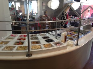 The display of toppings allows customers to choose however much they want and whatever they want.
